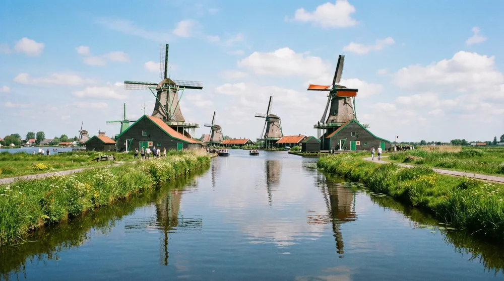 Traditional historic windmills at Zaanse Schans accessible via Amsterdam regional transport