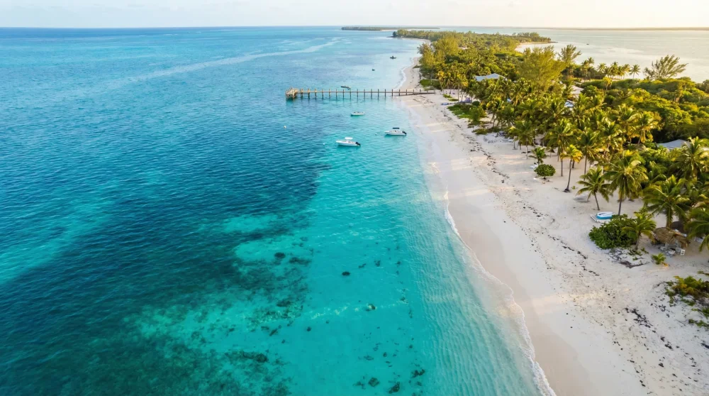 Aerial view of clear turquoise waters and white sand beaches in North Bimini Bahamas