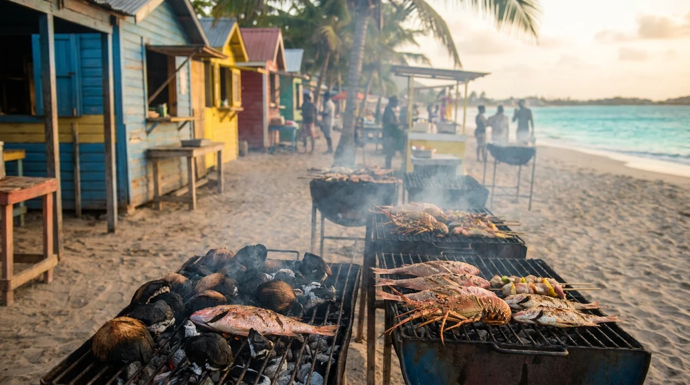 Smoky beachside fish-fry station on Pinney's Beach Nevis at sunset