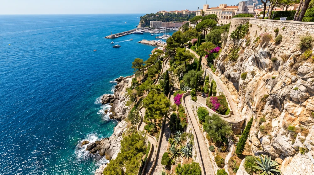 View looking down from Monaco-Ville cliff edge to the Mediterranean Sea via Saint Martin Gardens pathways