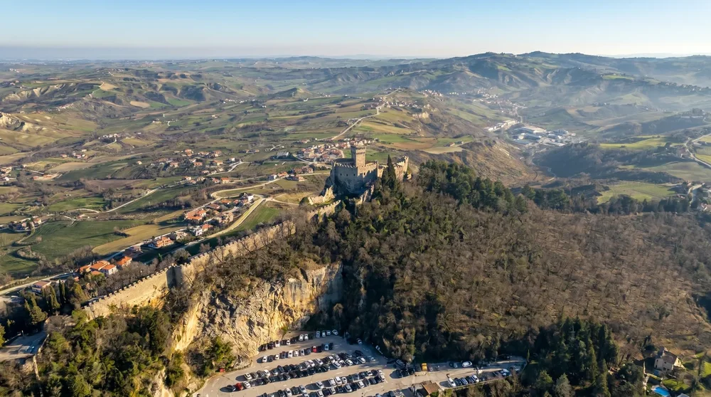 Montale tower on San Marino's third and highest peak seen from a distance, closed to public with no visible access path