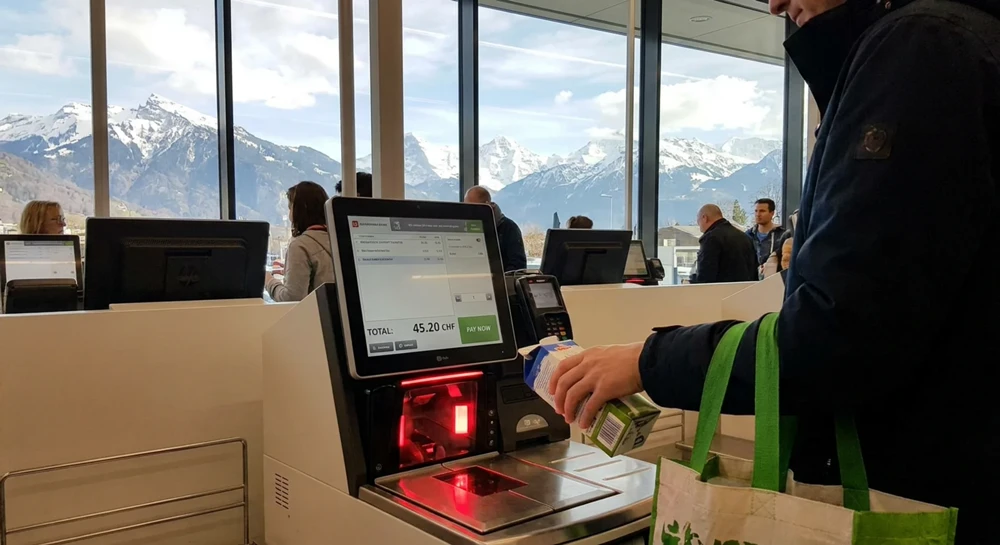 Self-checkout at a supermarket in Vaduz Liechtenstein showing Swiss franc prices on the screen