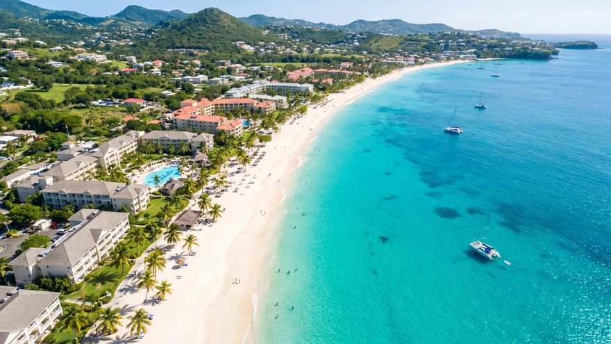 Aerial view of Grand Anse Beach with white sand and calm Caribbean waters