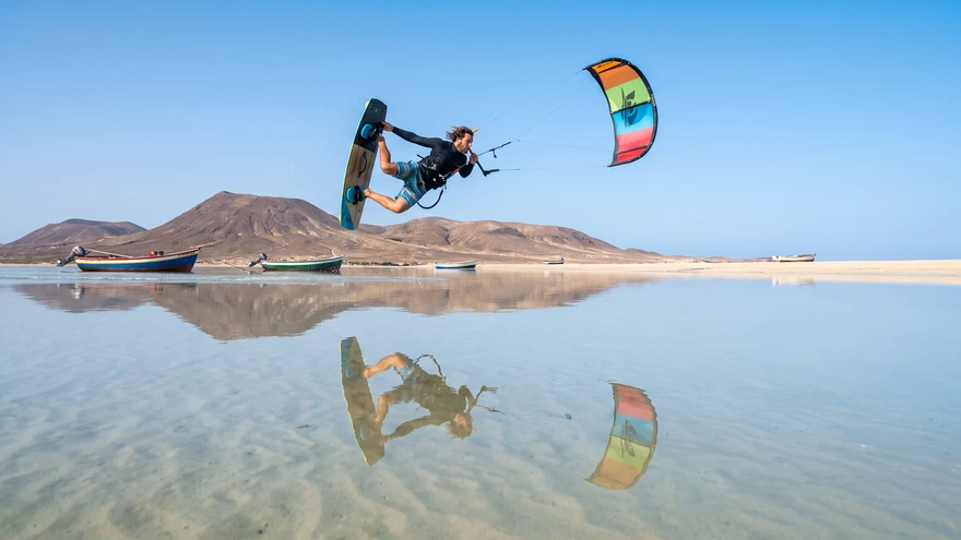 Freestyle kitesurfer on the flat water lagoon at Praia das Gatas, Boa Vista, Cape Verde
