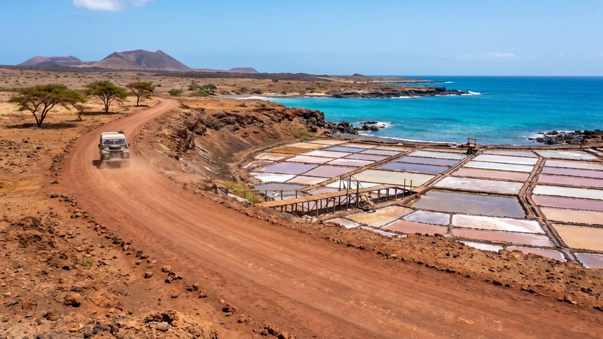 The dirt road leading past the Pedra de Lume salt pans toward Shark Bay on Sal Island, Cape Verde