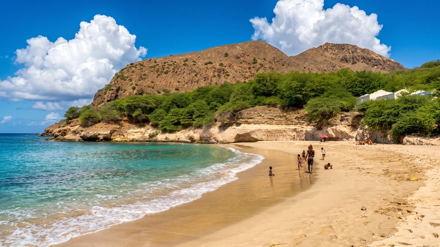 Tarrafal Beach horseshoe bay in Santiago island, Cabo Verde, with turquoise water, white sand, and dramatic volcanic mountain backdrop