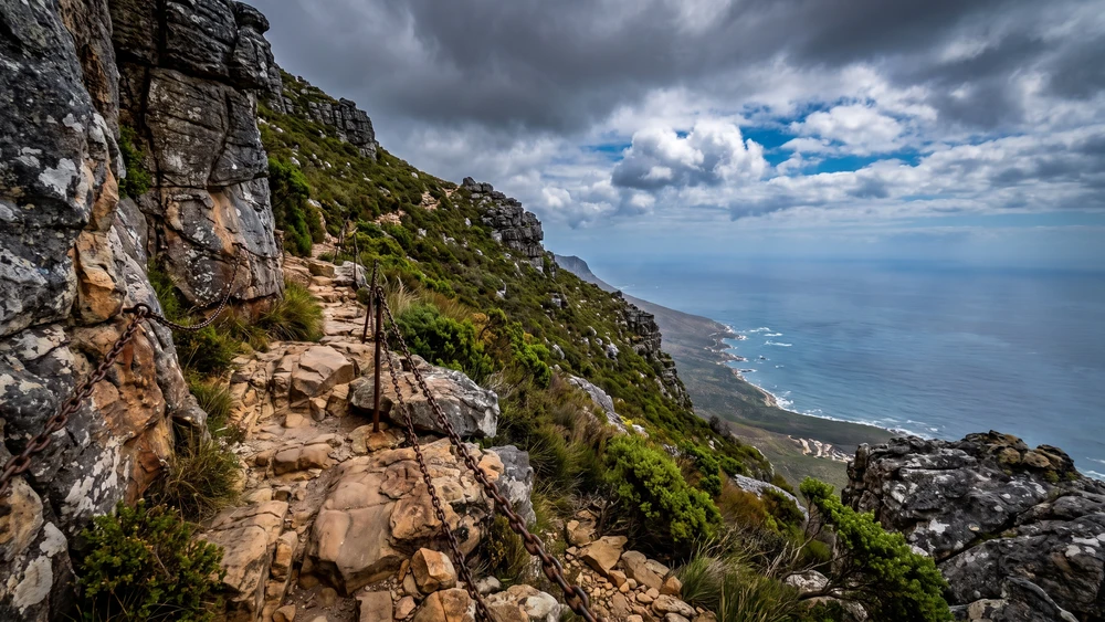 Zigzag hiking trail with chain handholds climbing Bobbejaanskop above Betty's Bay