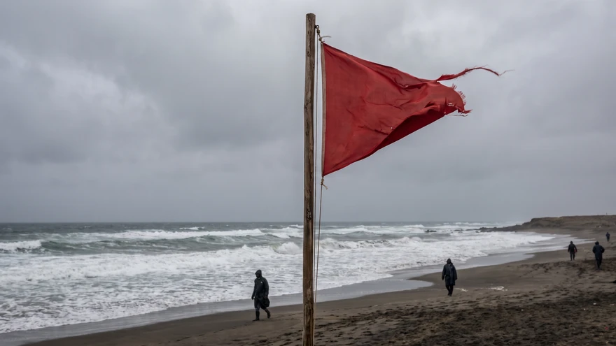 Red safety flag on a Cape Verde beach warning of strong Atlantic currents