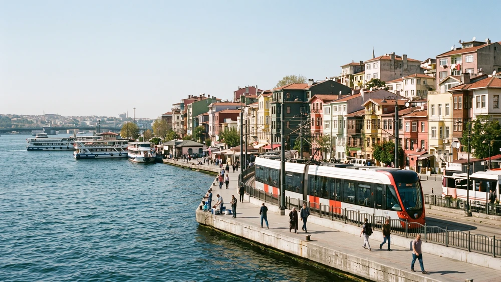 T5 tram passing Fener station on the Golden Horn near Balat