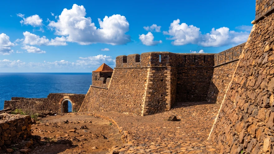 Stone walls and watchtower of the 16th-century Forte Real de Sao Filipe overlooking the ocean