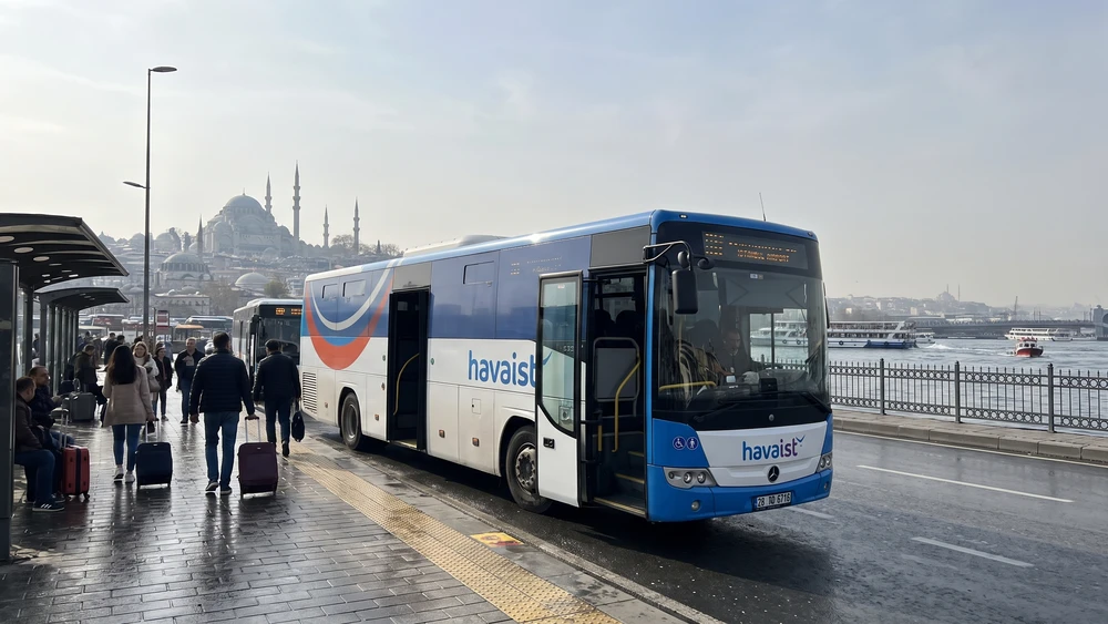 A Havaist HVIST-11 airport shuttle bus stopped near the Eminonu ferry docks