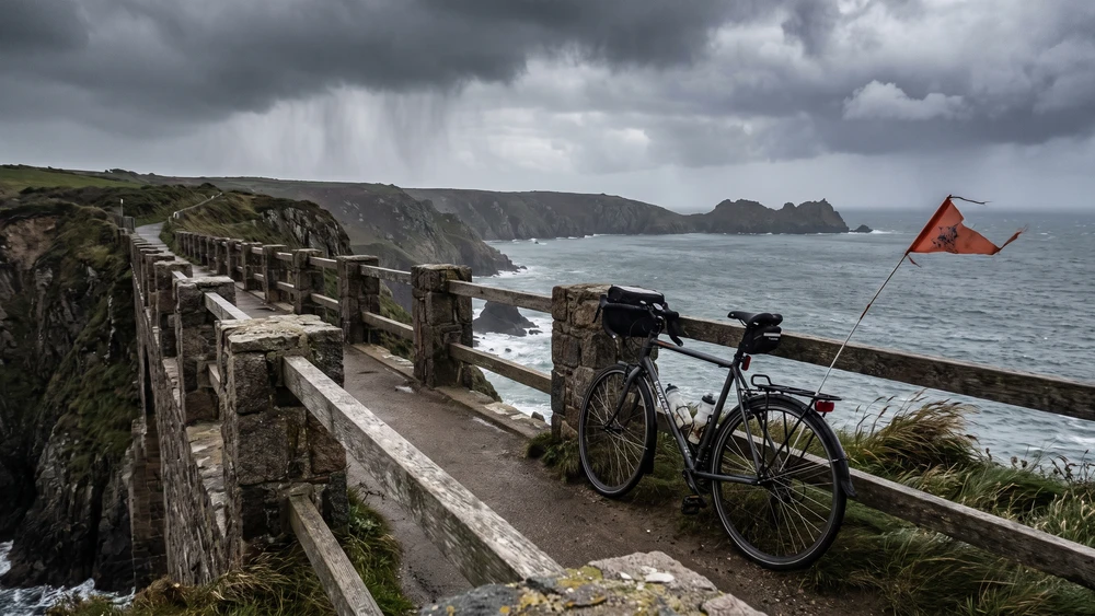 A bicycle at the railing of La Coupee causeway