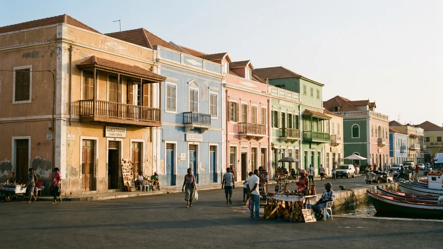Colorful colonial buildings and guesthouses around a town square near the harbor in Mindelo