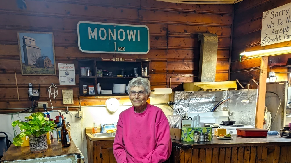 Wood-paneled interior of the small Monowi Tavern in Nebraska