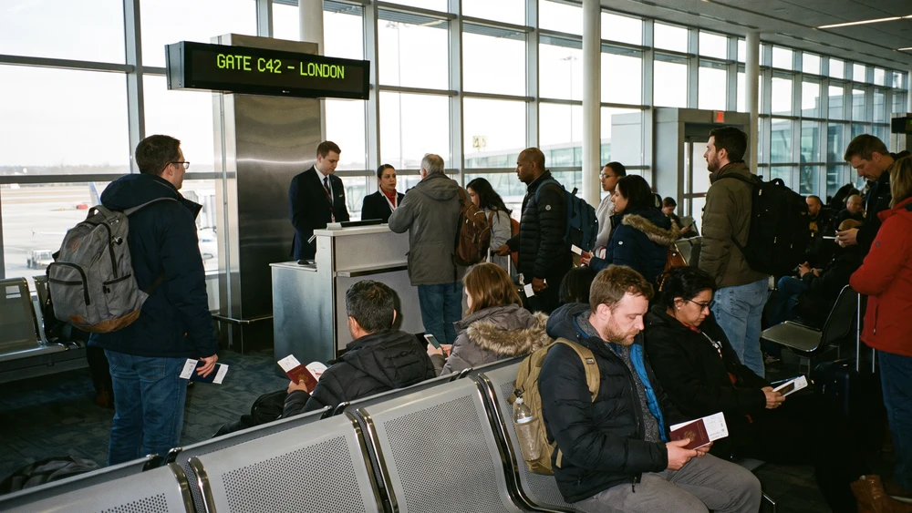 Passengers with passports at the international departure gate for Norfolk Island flights