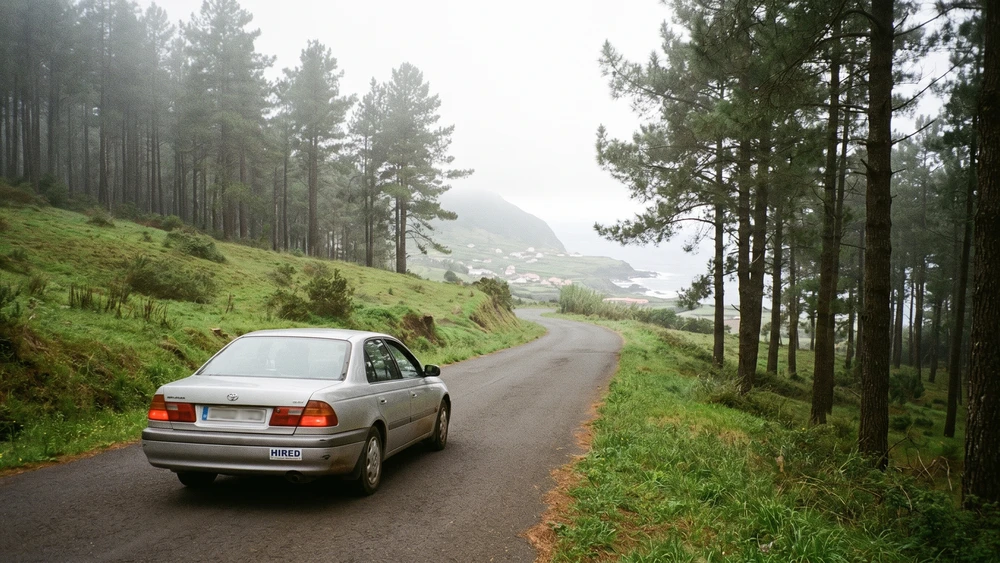 Rental car driving on a hilly road on Norfolk Island