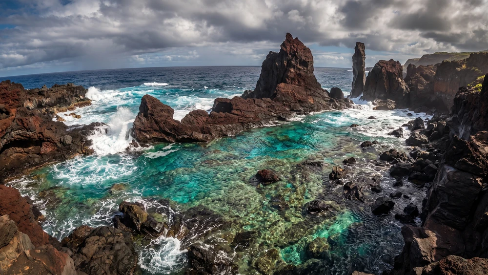 St. Paul's Pool tidal pool surrounded by volcanic rock spires on Pitcairn Island