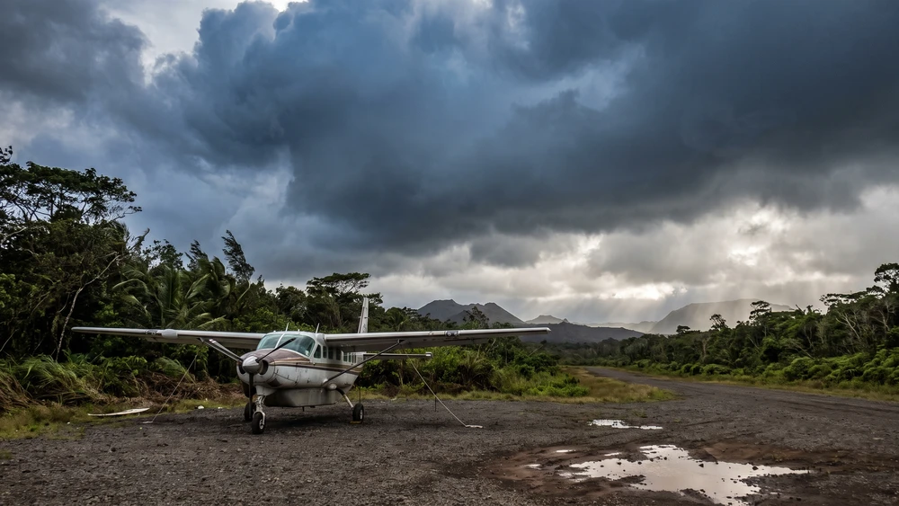 Storm clouds gathering over the remote island airstrip during cyclone season