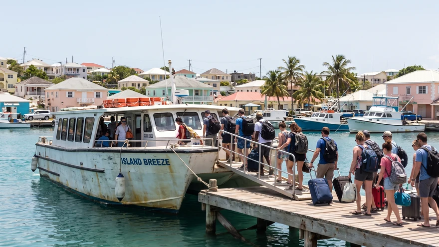 Passenger ferry boat docked at a small harbor connecting the Grenadine islands