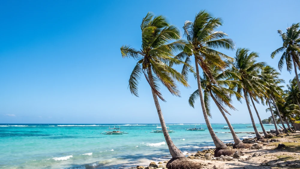 Steady trade winds rippling across the lagoon during the dry season